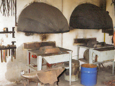 2 Forges at Blacksmith School, note Rounded Hoods