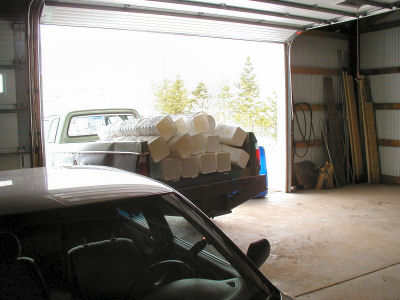 A truck full of Pails to be Cleaned