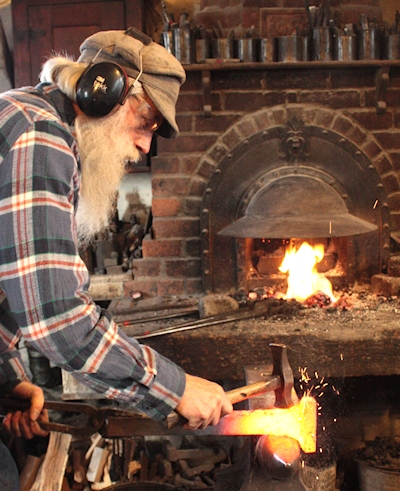 Tom at the forge